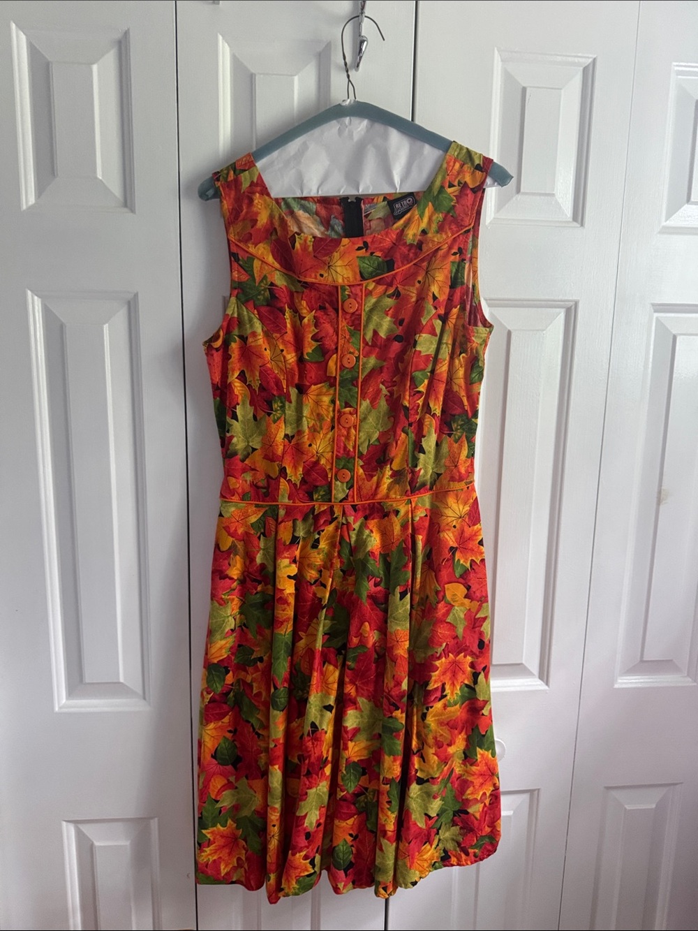 Retrolicious Sleeveless Midi Dress in Red, Green & Yellow Leaf Print